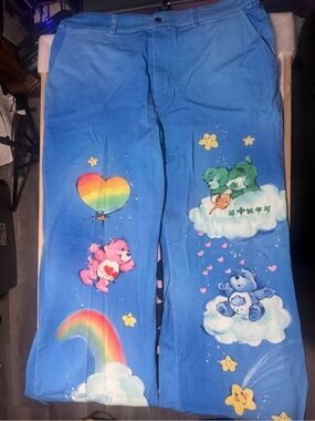 Dolls Kill Blue Wide Leg Pants with Rainbow Care Bears Print